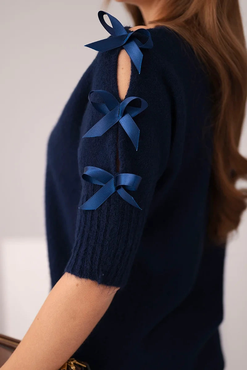 damski sweter fioletowy z krótkimi rękawami i ozdobnymi kokardkami