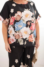 Komplet damski plus size z bluzką i spodniami w kwiaty z szeroką nogawką Dalia