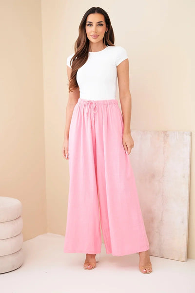 Cukierkowy róż spodnie damskie szerokie palazzo z elastycznym pasem i wiązaniem