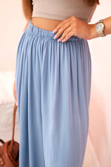 damskie spodnie wiskozowe szerokie białe z elastyczną gumką w pasie