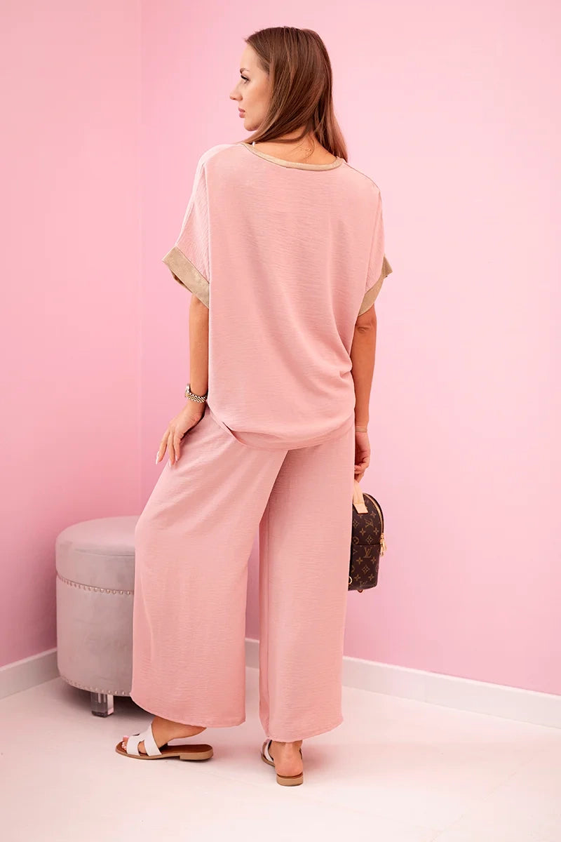 damskie ubrania z wiskozy w ciemnym pudrowym różu ze złotym obszyciem