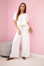 damskie ubranie z wiskozy w ciemnym pudrowym różu ze złotym obszyciem