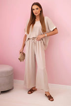 damskie spodnie i bluzka z wiskozy w ciemnym pudrowyrosezie ze złotym obszyciem